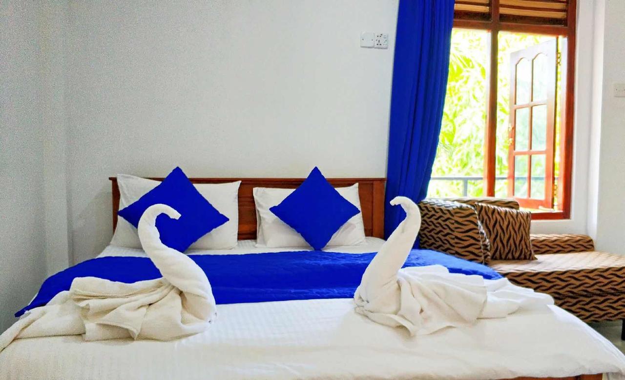 Blue Whale Holiday Hotel 米瑞莎 外观 照片